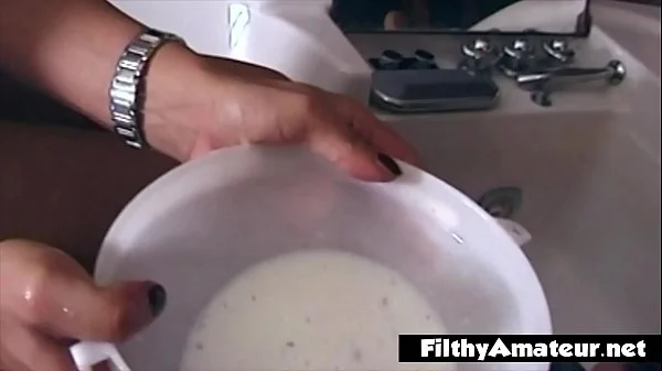 A depraved whore gets a milk demijohn in her ass